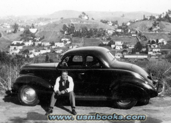 Donald E. Brogan and his Ford Coupe