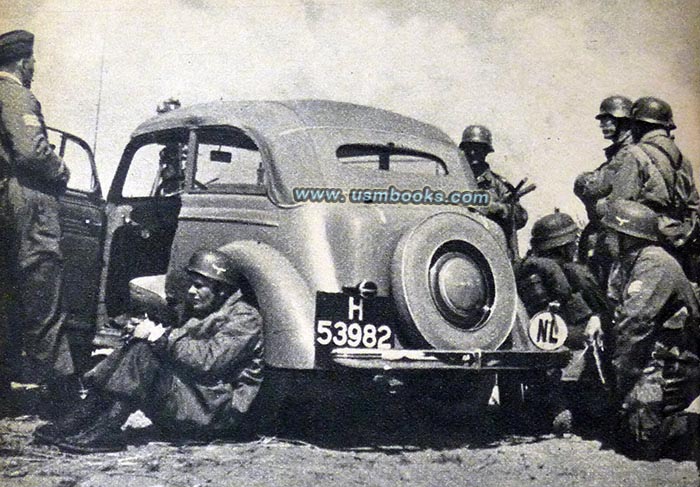 Nazi paratroopers with confiscated Ford in Holland