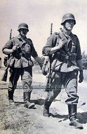 Nazi uniform with boot, helmet, machine gun