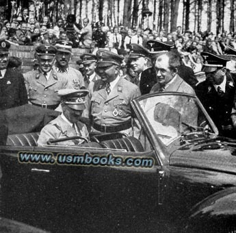 With Hitler and Dr. Porsche