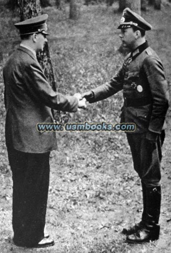 Hitler awarding the Knight's Cross of the Iron Cross with Oak Leaves to Rittmeister Horst Niemack