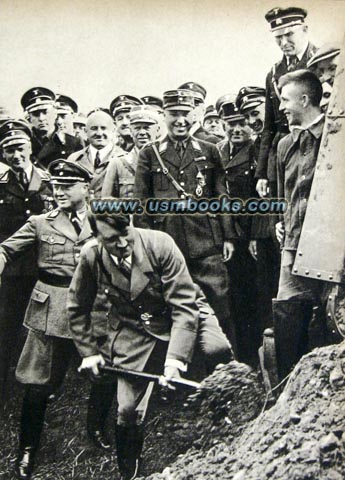 Hitler on 23 September 1933 with the first shovel of dirt that started the construction of the freeway between Frankfurt - Darmstadt - Heidelberg