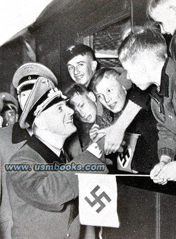 Deputy Hitler Youth leader Artur Axmann, HJ boys, swastika flags