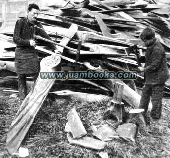 cutting up airplane propellors with a bucksaw